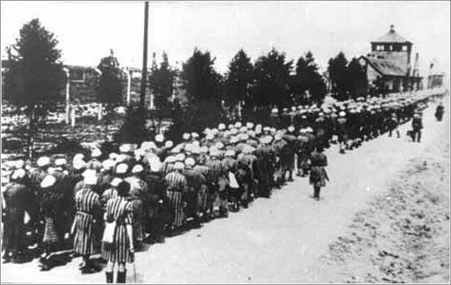Prisoners being returned to the Ravensbruck Women's Concentration Camp after a day of forced labor.